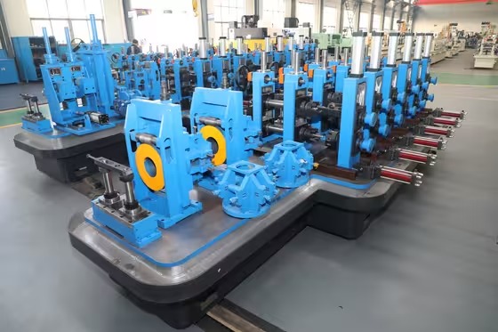 Tube mill sizing section with roller stands and drive components